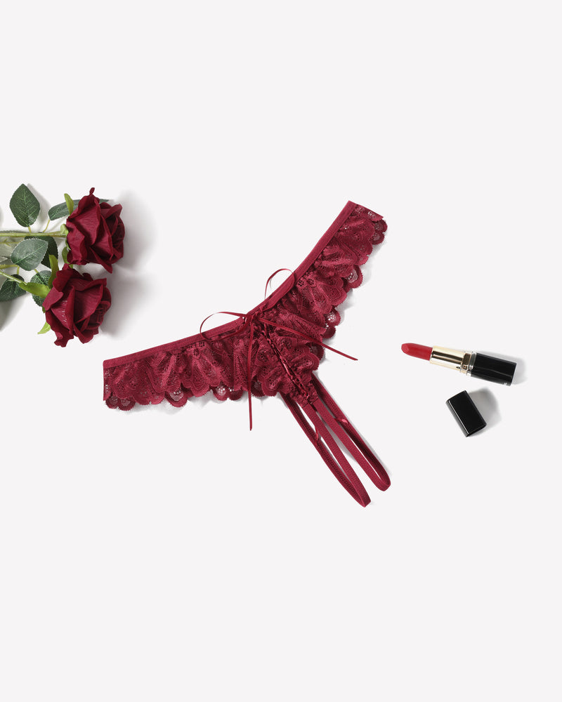 Wine red lace thong briefs with lace panel, bow ties, and crisscross back straps