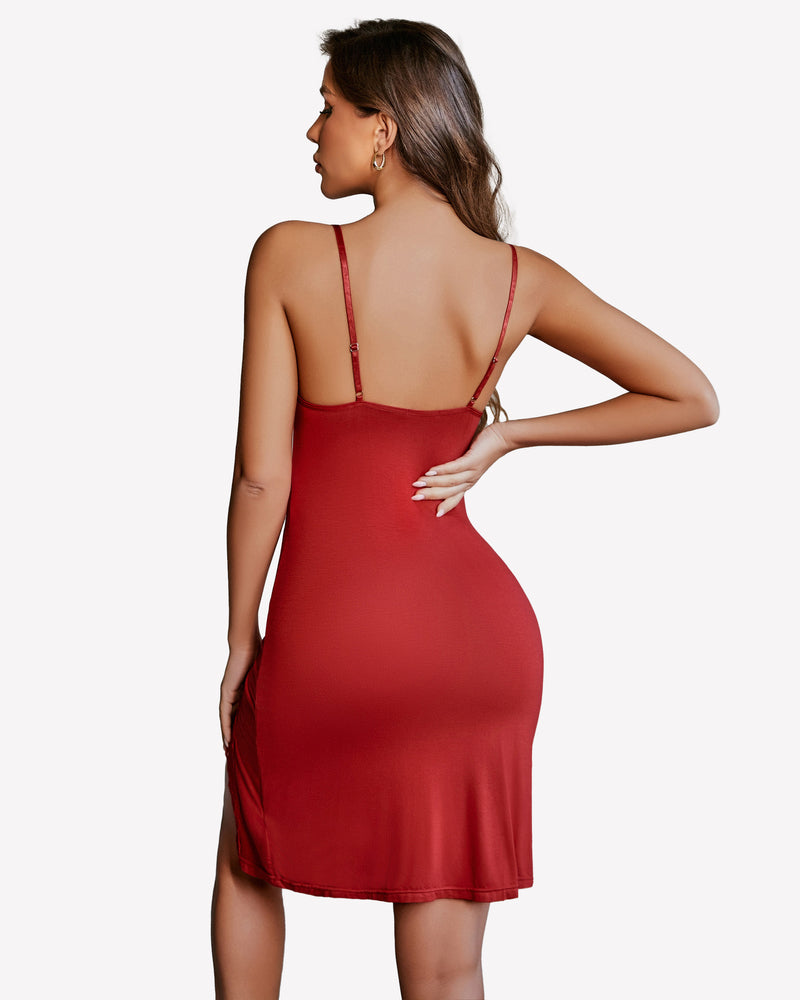 Red lace nightgown chemise with spaghetti straps and side slit, shown from back