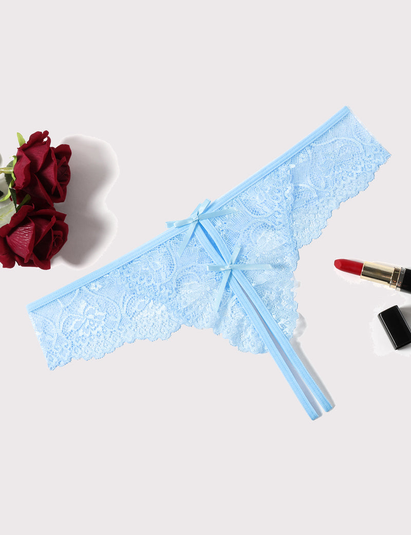 Light blue lace thong panties with bow and ribbon ties, angled flat lay