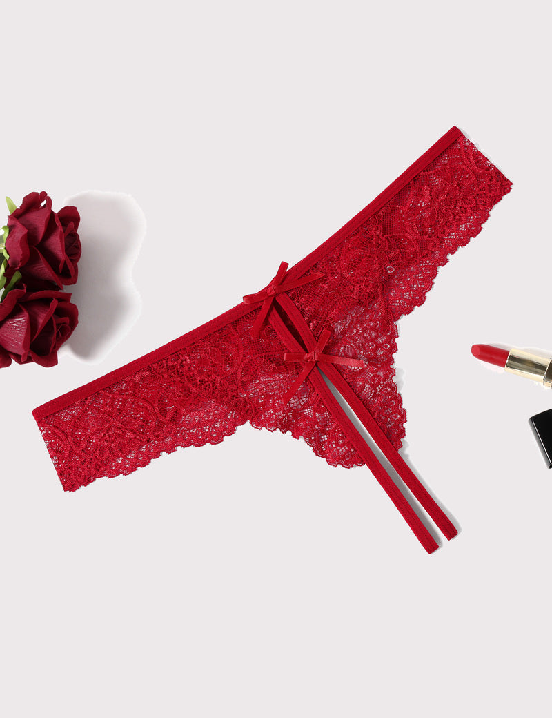 Red lace thong panties with bow ties and scalloped lace trim, side view