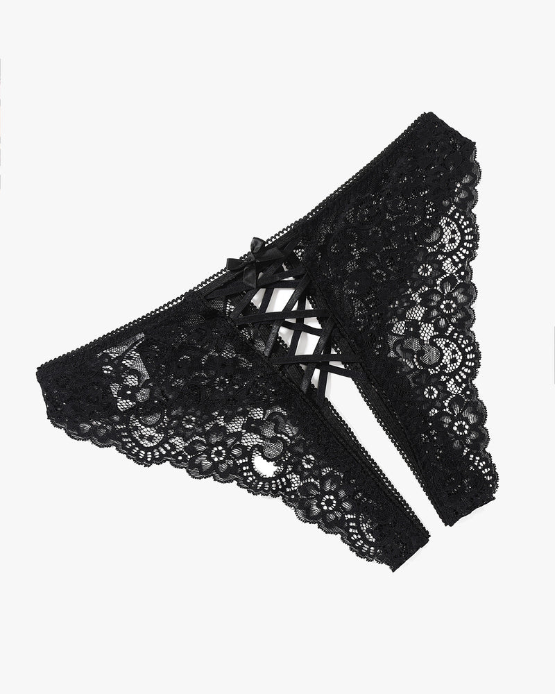 Black lace hipster panty, side view, with crisscross strap panel and ribbon bow