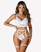 White lace bra and panty set with garter straps and gold-tone chain accents