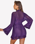 Purple mesh robe with lace cuffs and ruffled hem over lingerie