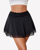 Black pleated lace-mesh skirt with ruffled hem and elastic waistband