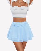 Light blue pleated lace-mesh skirt with scalloped lace waistband and ruffled hem