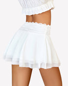 White pleated lace mesh layered ruffled skirt with lace-trim waistband