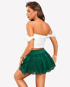 Green pleated mini skirt with lace ruffle hem from the back view