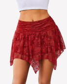 Red layered asymmetrical short skirt with gathered ruffle tiers and lace overlay hem