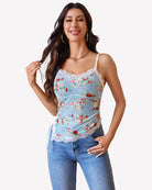 Light blue floral sheer cami crop top with lace trim and adjustable spaghetti straps.