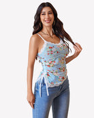 Floral sheer cami top with lace trim, spaghetti straps, and drawstring waist tie