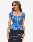 Blue swirl print sheer mesh short sleeve top with square neckline and puff sleeves