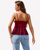 Ruffle cami top in deep red with open-back straps and peplum ruffle hem