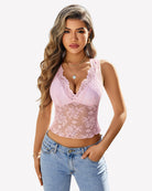 Pink lace tank top with deep V-neck, scalloped edge and sheer floral mesh overlay.