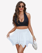 White tiered mesh skort with drawstring ties and bow details
