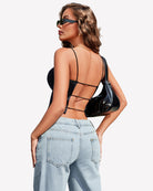 Double-lined cropped vest top, black strappy open back with thin spaghetti straps