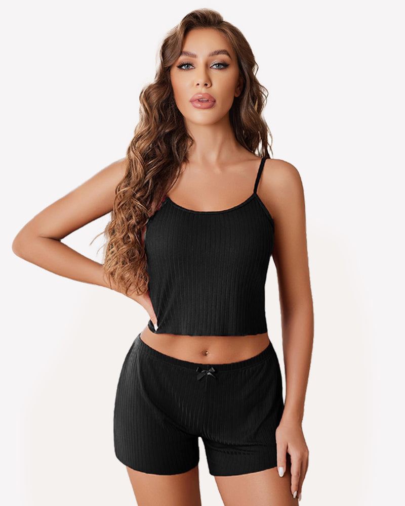 Black ribbed cami pajama set with thin straps and matching drawstring shorts
