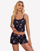 Black ribbed cami pajama set with pink cherry print and matching shorts
