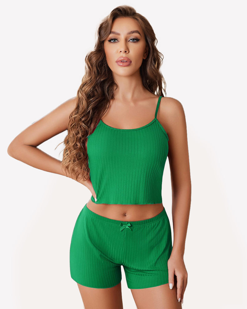 Green ribbed cami pajama set with spaghetti straps and matching drawstring shorts