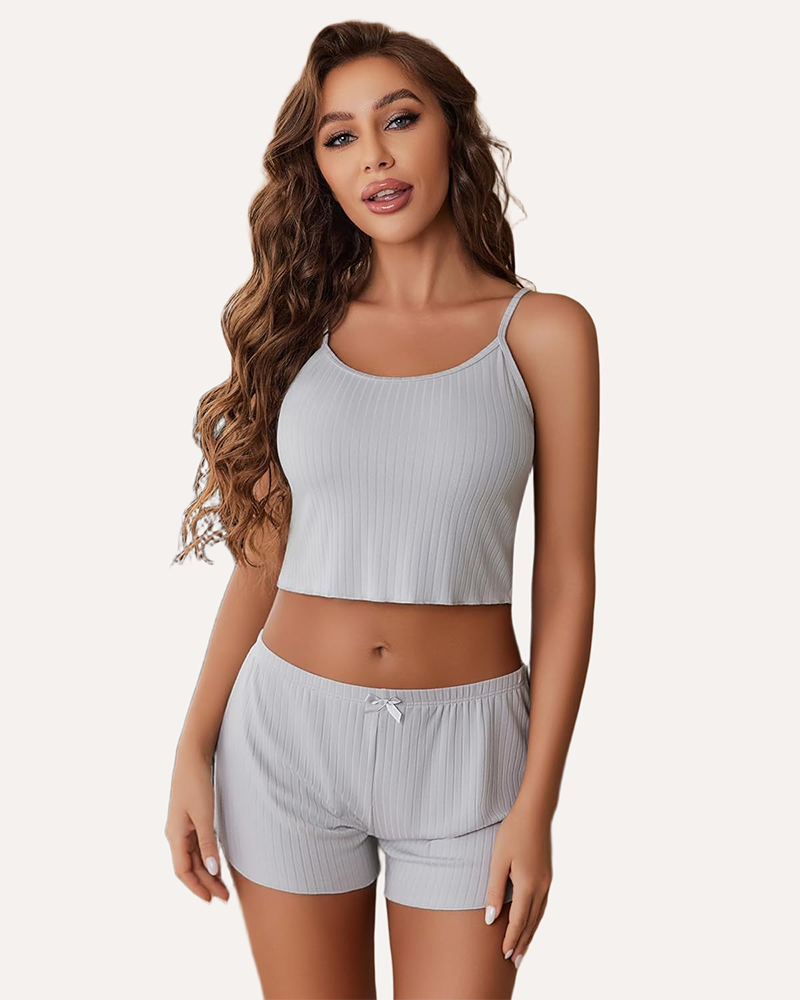 Light gray ribbed cami pajama set with spaghetti straps and matching drawstring shorts