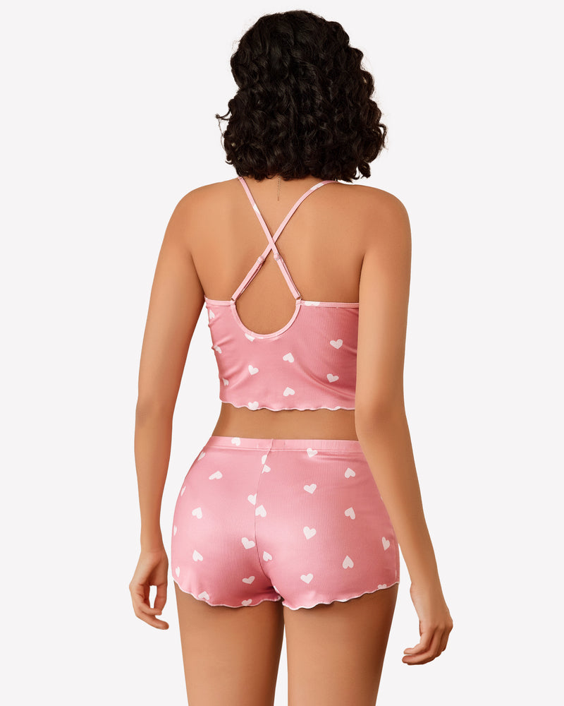 Cami pajama set, pink heart-print camisole and shorts with crisscross back straps.