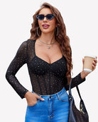 Black sparkle mesh long-sleeve bodysuit with corset-style seams and sweetheart neckline.