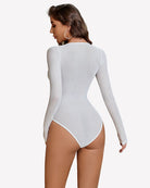 White sparkle mesh long-sleeve bodysuit from back with glitter speckle pattern