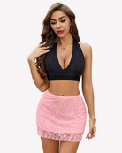 Pink lace mini skirt with sheer overlay and scalloped hem, fitted high-waist.