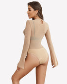 Nude long sleeve rhinestone bodysuit with open back cutout and flare sleeves.
