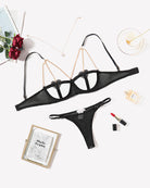Black chain-heart cutout bra and thong set with gold-tone chain straps