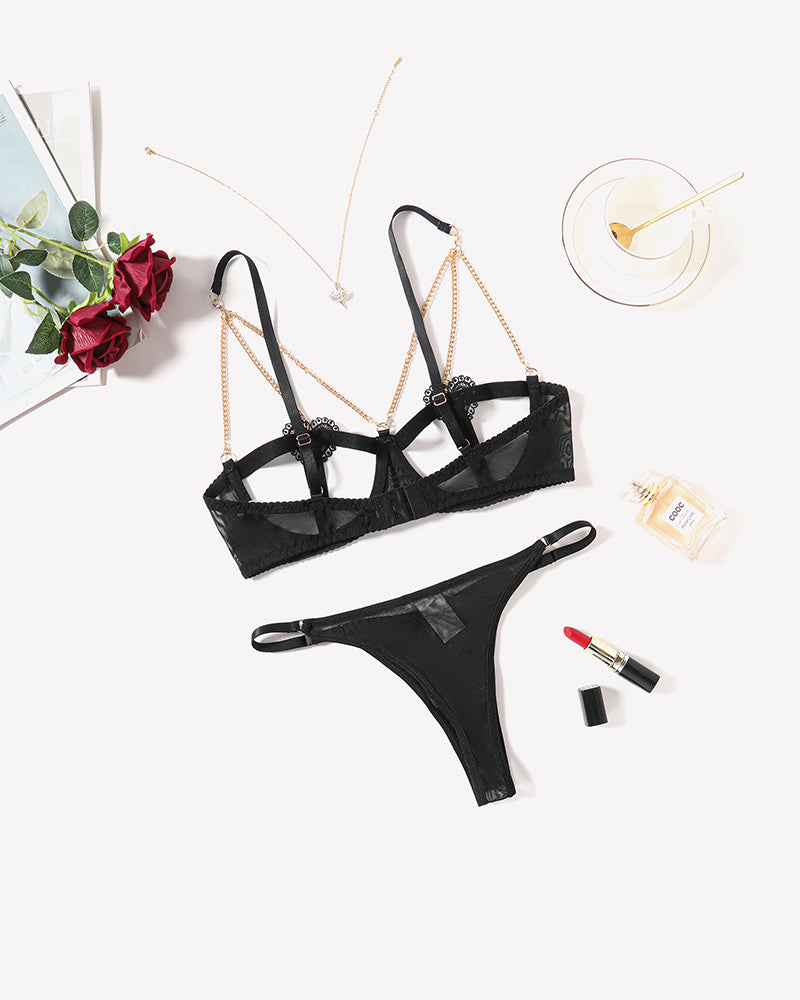 Black chain-heart cutout bra and thong set with lace heart detail
