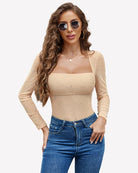 Nude rhinestone mesh long-sleeve bodysuit, square neckline, sparkle details