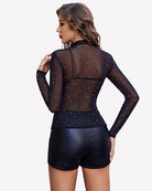 Sheer rhinestone mesh top with long sleeves and high back, black with scattered sparkles
