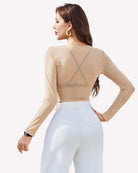 Light tan rhinestone mesh see-through long-sleeve crop top, back view