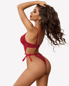 Red lace bodysuit with deep V back and thin straps, satin side ties
