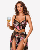 Black floral mesh 3-piece lingerie set with underwire bra and thong, side-split skirt