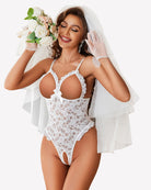 White lace teddy bodysuit with ruffled trim, underwire cups, and bow center