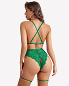 Green lace crotchless bodysuit with garter belt, crisscross back straps and garter legs