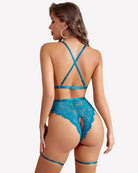 Blue lace crotchless bodysuit with garter belt, crisscross back straps