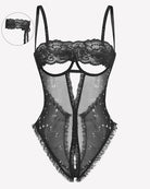 Black lace V-neck crotchless teddy with star print sheer panels and lace trim; straps.