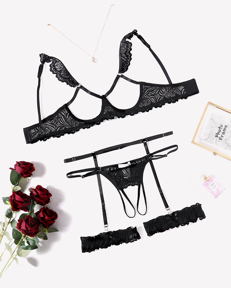 Black lace bra, garter belt and panty lingerie set with scalloped lace trim