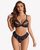 Black mesh lace bra and matching thong panty set with ruffle trim