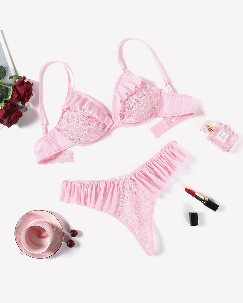 Pink lace bra and panty set with ruffled edges and scalloped lace trim