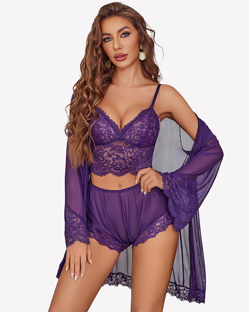 Purple lace bralette and panty set with sheer robe over arms
