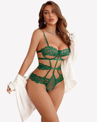 Green underwired one-piece bodysuit with lace cups, crisscross straps, and scalloped band