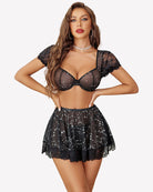 Black star-print sheer mesh bra and tiered mini skirt with lace trim set