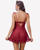 Red mesh babydoll dress with back strap detail and ruffled hem, back view