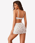 White lace bralette back and mini skirt with lace-up side openings