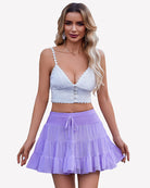 Light purple pleated mini skirt with tiered ruffles and tied waistband