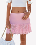 Pink ruffle-trim bodycon skirt with lace overlay and scalloped hem.