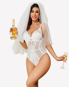 White lace bodysuit with plunging neckline and sheer corset panel
